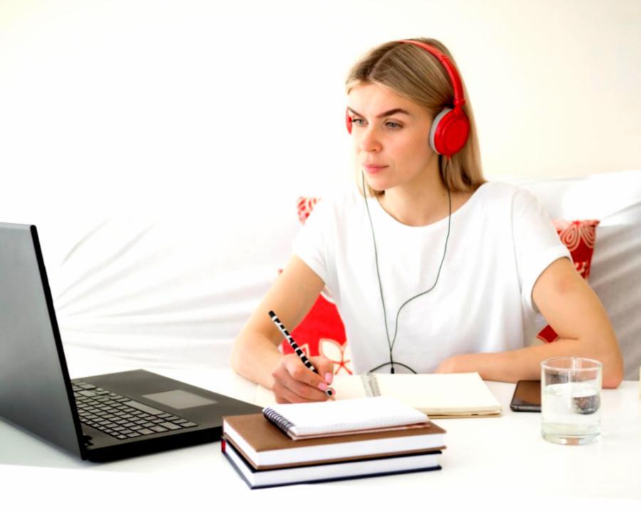 Creative workspace showing video production equipment and planning materials